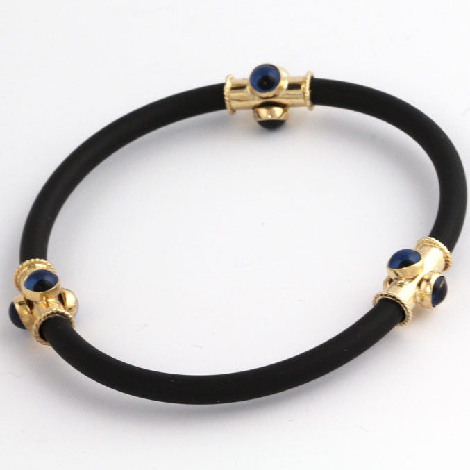 ML0325b Rubber and Gold Bracelet w/Evil Eyes _2